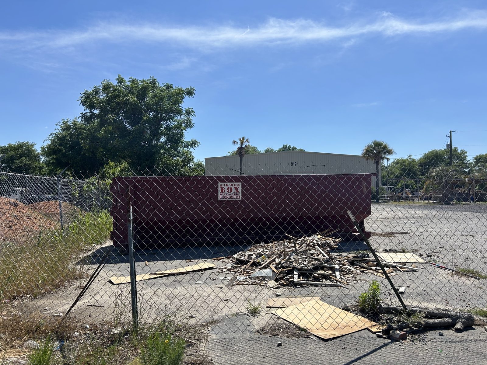 Big Red Box roll-off dumpster on a demolition cleanup job in Columbia, SC