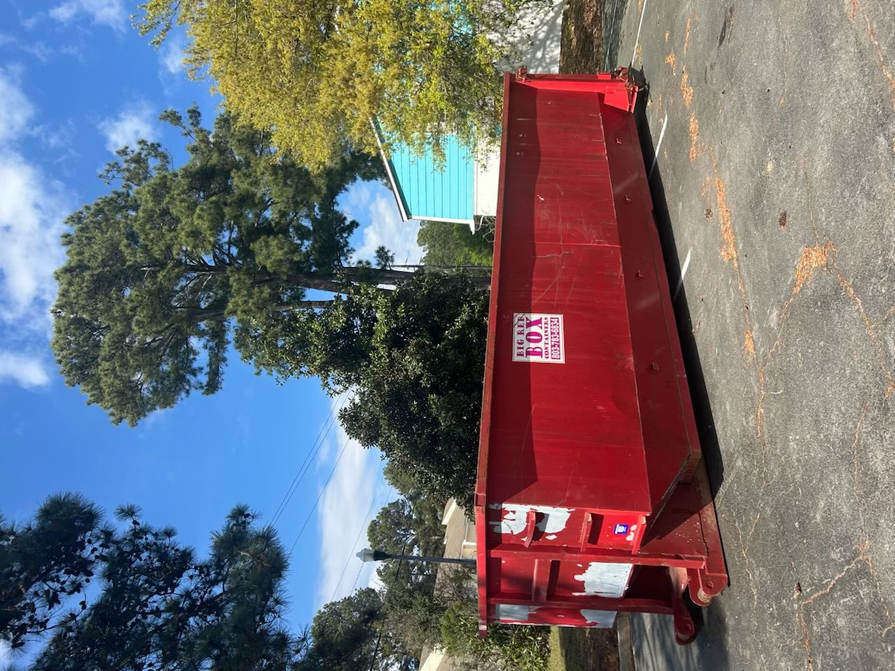 Big Red Box roll-off dumpster on a residential job in Forest Acres, SC