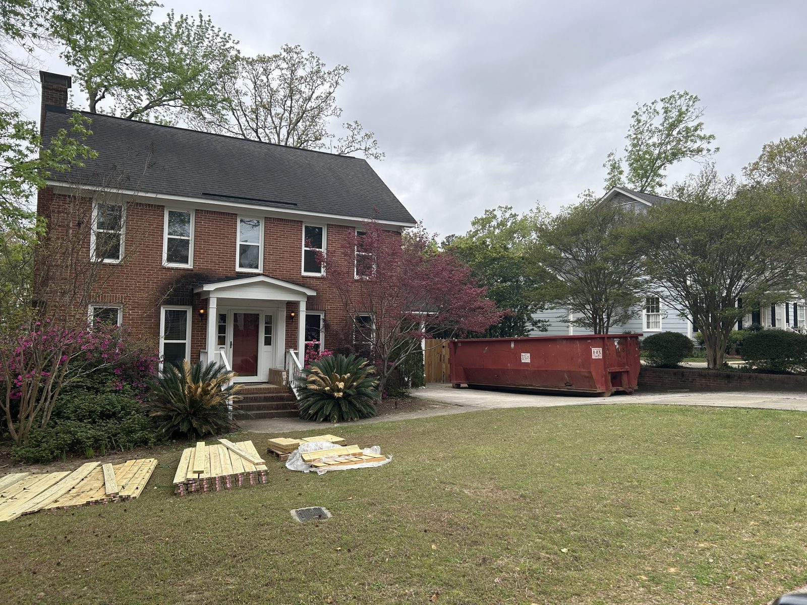 Big Red Box roll-off dumpster on a residential renovation job in Columbia, SC